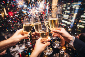 all images group hands holding champagne glasses